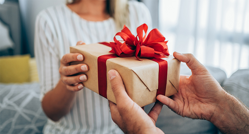 Couple exchanging a gift