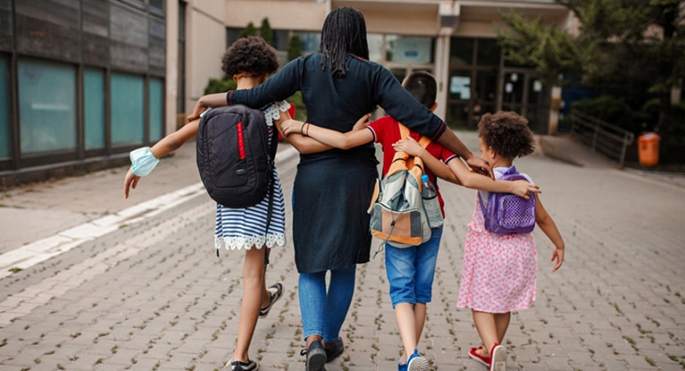 Family walking to school